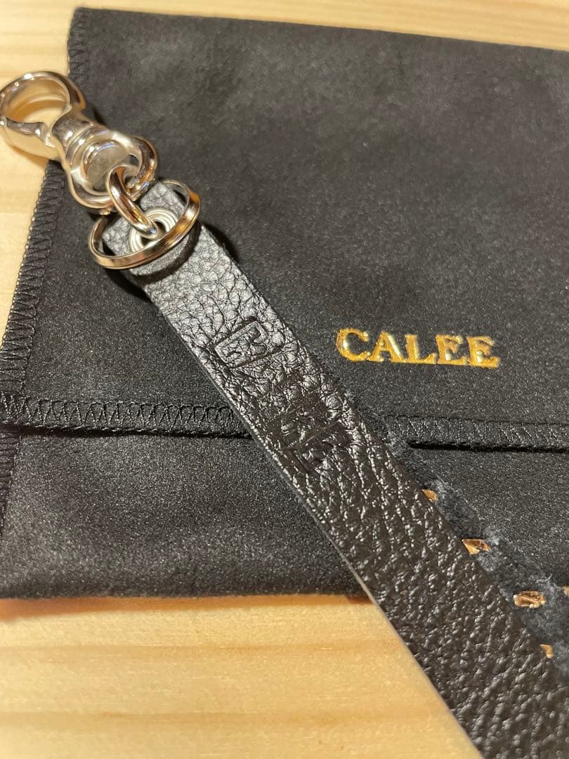 CALEE キャリー レザースタッズキーホルダー ロングタイプ