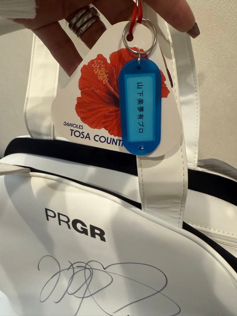 PRGRゴルフバッグ　山下美夢有プロ直筆サイン付 新品未使用　タグ付き